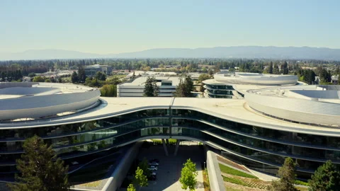 Drone shot of Apple wolf campus in San Jose showing the building and the Stock Footage 340037739