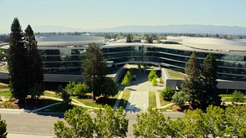 Drone shot of Apple wolf campus in San Jose showing the building and the Stock Footage 340037980