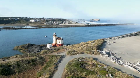 Drone shot approaches lighthouse along the Coquille river Stock Footage 251756097
