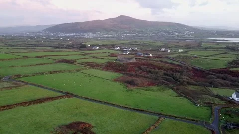 Drone Shot Approaching Cahergal Stone Ringfort in the Rural Patchwork Landscape Stock Footage 333716182