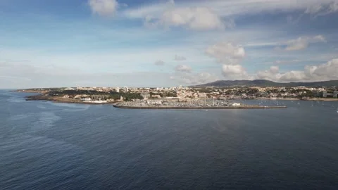 Drone shot approaching Cascais city on the Atlantic ocean with large marina Stock Footage 206743308