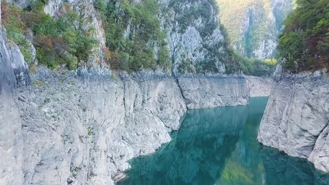 Drone shot of the aqua colored Piva River in Montenegro Stock Footage