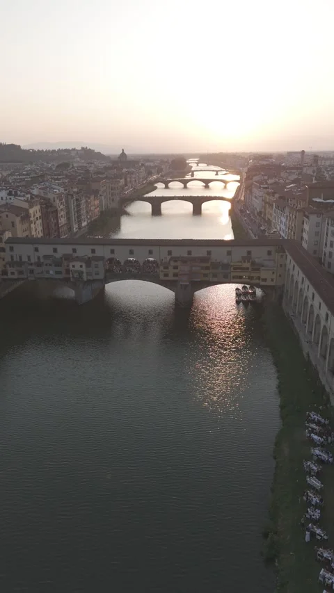 Drone shot of Arno river and Ponte vecchio at Florence Dlog-m 10 bit Stock Footage 312699475