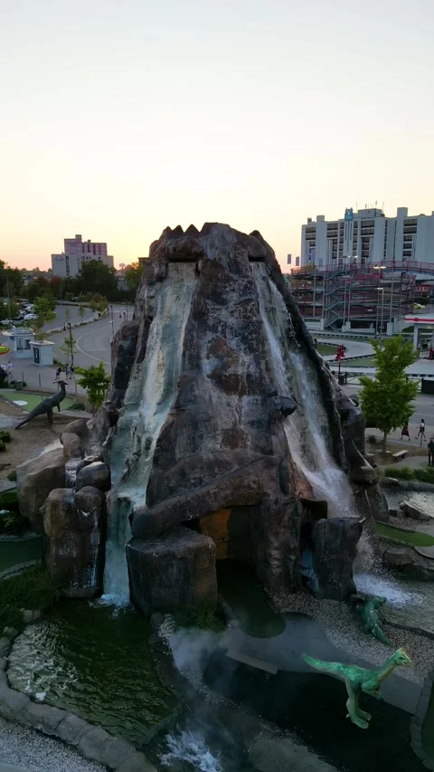 Drone Shot of Artificial Volcano Waterfall at Clifton Hill Amusement District Video stock 330450804