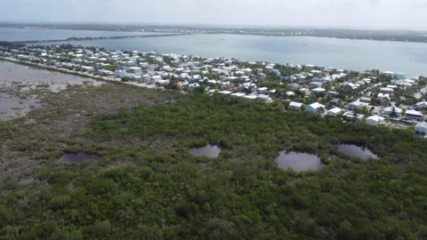 Drone shot ascending on Middle Torch Key Five 2026 Summer Stock Footage 344008240