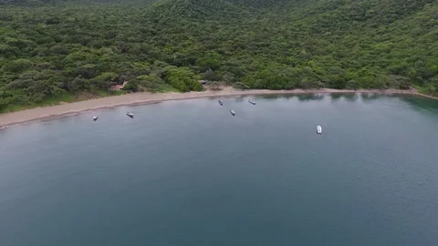 Drone Shot of Bay with Village Fisherman boats on Virgin Beach 422 Stock Footage