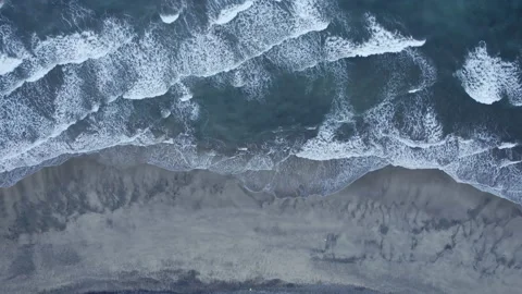 A drone shot of a beach and ocean in Maspalomas, Gran Canaria Stock Footage 212435939