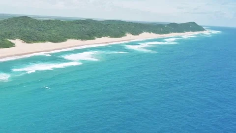 Drone shot of beach, approaching shoreline Stock Footage 304266954