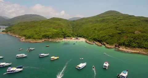 Drone shot beach party on a remote island in Hong Kong Sai Kung V1-0026 Stock Footage 149474648