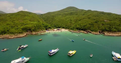 Drone shot beach party on a remote island in Hong Kong Sai Kung V1-0027 Stock Footage 149475877