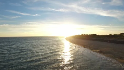 Drone shot of the beach at sunset Stock Footage 94207917