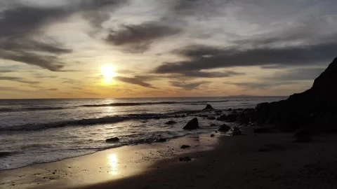 Drone shot at beach via sunset Video stock 297228611