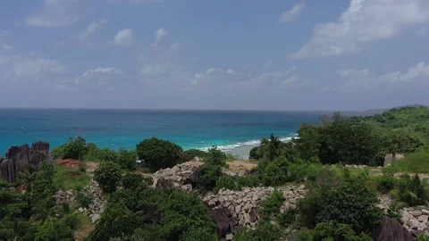 Drone shot: Beautiful beach on La Digue island, Anse Severe - Seychelles 動画素材 105354536