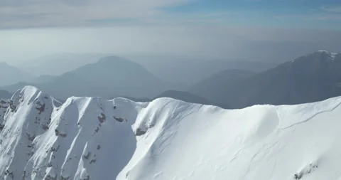 Drone Shot Of Beautiful Mountains Covered With Snow Stock Footage 140318496