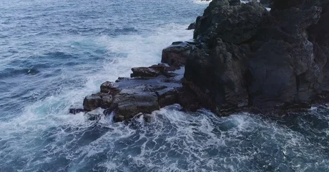 Drone shot of beautiful oceanic waves crashing on rocks bundle Stock Footage 83870896
