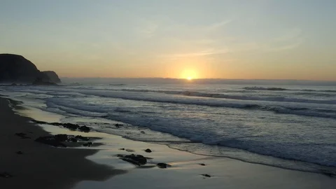 Drone Shot Of Beautiful Sunset Over The Big Ocean Waves Stock Footage 128843166