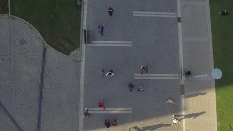 Drone shot of below people walking. Stock Footage 76293728