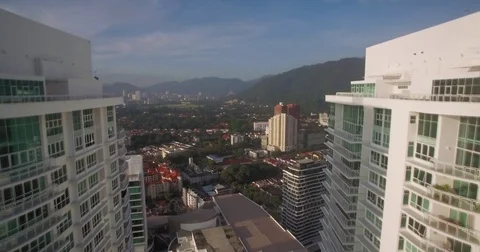 Drone Shot Between Luxury Condos on Gurney Drive, Penang, Malaysia Stock-Footage 76110373