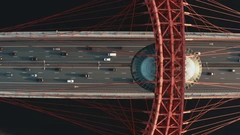 Drone shot of a big bridge over the river, many cars moving on multi-lane road Stock Footage 145586112