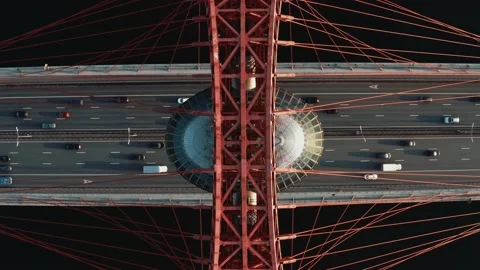 Drone shot of a big bridge with river, many cars moving on multi-lane road 스톡 동영상 144344573