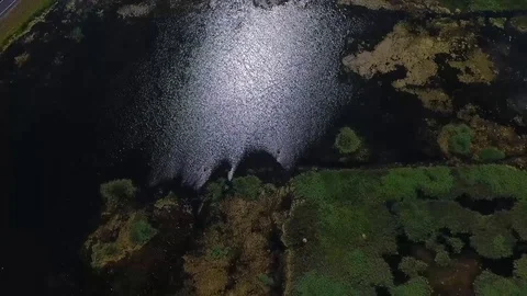 Drone shot of big lake in summer Stock Footage 117848843