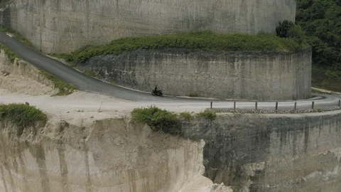 Drone shot, biker on the mountain road on Bali island Stock Footage 120830786