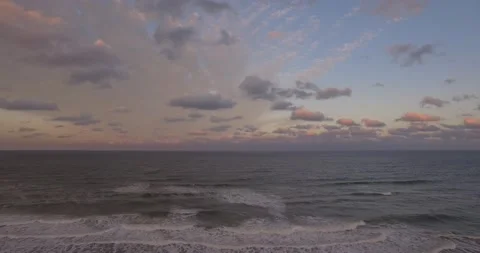 Drone shot of Blackhawk crossing frame while tilting up Stock-Footage 133544215