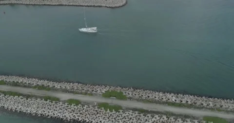 Drone Shot of Boat Entering Puerto Cancún Marina Stock Footage 146343853