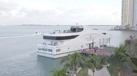 Drone  Shot of Boat Speeding in Background Of Dock Video stock 104505737
