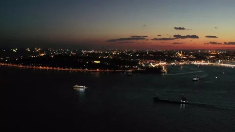 Drone shot of the Bosphorus, nightless, half dark, half sunset Stock Footage 145196534