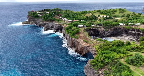 Drone Shot of Broken Beach Natural Arch and Coastal Cliffs, Nusa Penida Stock Footage 331214118
