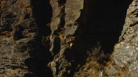 Drone shot of brown red mountains in Queenstown, New Zealand. Stock Footage 89516636
