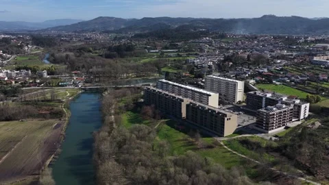 Drone shot Building blocks next to river. Stock Footage 332594427