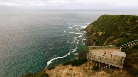 Drone shot of bush walker on scenic lookout at Bridgewater Bay. Stock Footage 86888729