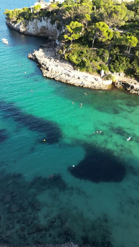 Drone shot in Cala Llombards at sunset, Mallorca, Spain Stock Footage 254634270