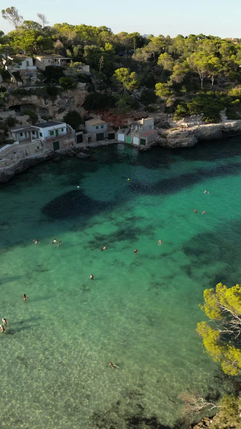 Drone shot in Cala Llombards at sunset, Mallorca, Spain Stock Footage 254636154