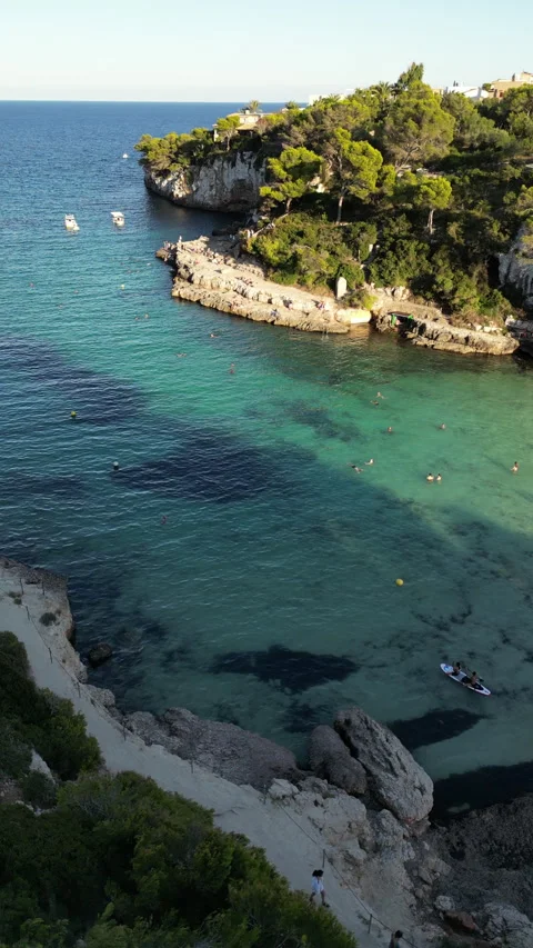 Drone shot in Cala Llombards at sunset, Mallorca, Spain Stock Footage 254637707