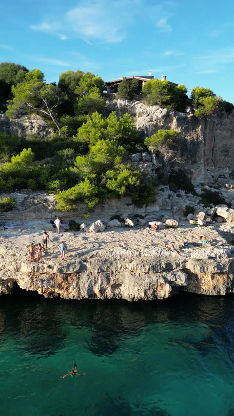 Drone shot in Cala Llombards at sunset, Mallorca, Spain Stock Footage 254642816