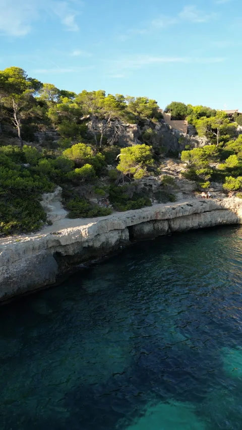 Drone shot in Cala Llombards at sunset, Mallorca, Spain Stock Footage 254661168