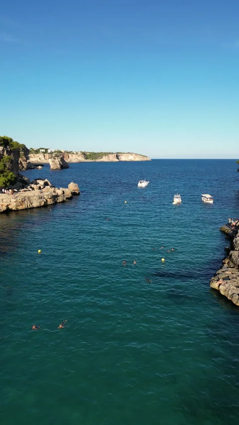 Drone shot in Cala Llombards at sunset, Mallorca, Spain Stock Footage 254663054
