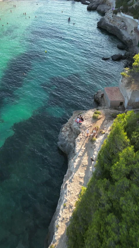 Drone shot in Cala Llombards at sunset, Mallorca, Spain Stock Footage 254774361