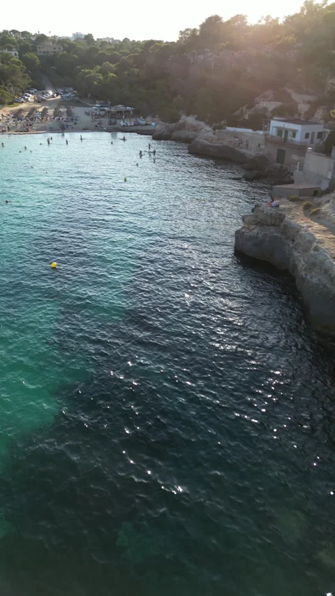 Drone shot in Cala Llombards at sunset, Mallorca, Spain Stock Footage 254776235