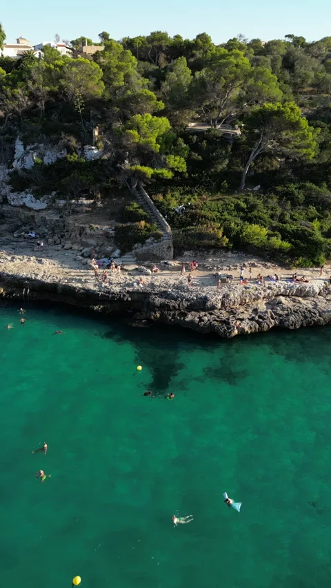 Drone shot in Cala Llombards at sunset, Mallorca, Spain Stock Footage 254781699