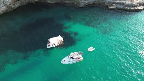 Drone shot in Cala Llombards, view of boat, Mallorca, Spain Stock Footage 254628223