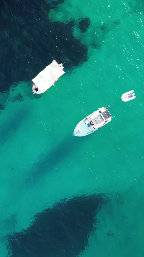 Drone shot in Cala Llombards, view of boat, Mallorca, Spain Stock Footage 254631542