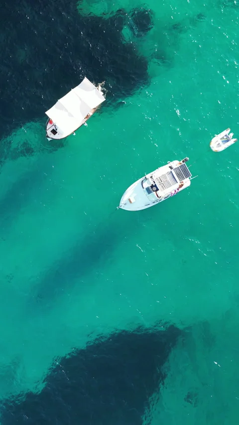 Drone shot in Cala Llombards, view of boat, Mallorca, Spain Stock Footage 254631577