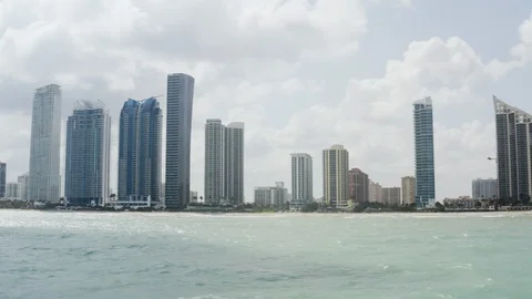 Drone shot from calm ocean of different height skyscrapers on Florida shore Stock Footage 126613850