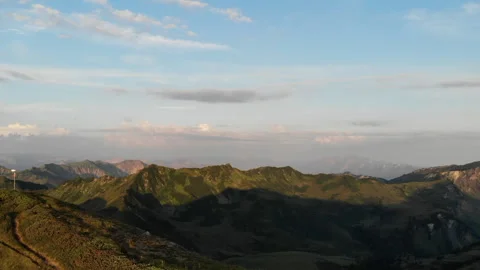 Drone Shot of  Camp Tent On Top Of Mountain Overlooking Town Green Stock Footage 266282260