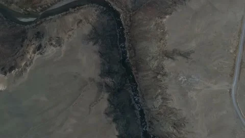 Drone shot of a canyon with a river Stock Footage 227127524