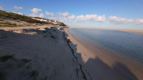 Drone shot captures tranquil seaside landscape with sandy shores Video stock 344580853